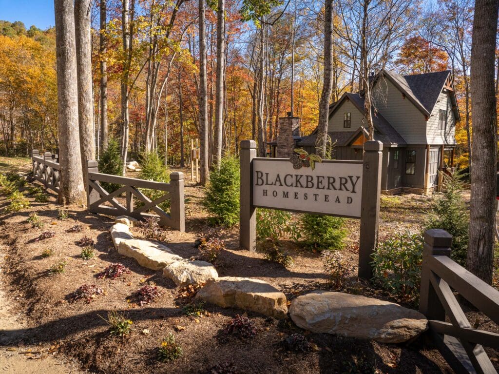Blackberry Homestead entrance with autumn trees.