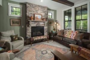 Cozy living room with stone fireplace.